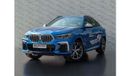 BMW X6 AED 4,167 PM • X6 M50i • 4.4L TURBOCHARGED V8 • LOW KM • OFFICIAL BMW WARRANTY + SERVICE PLAN UNTIL