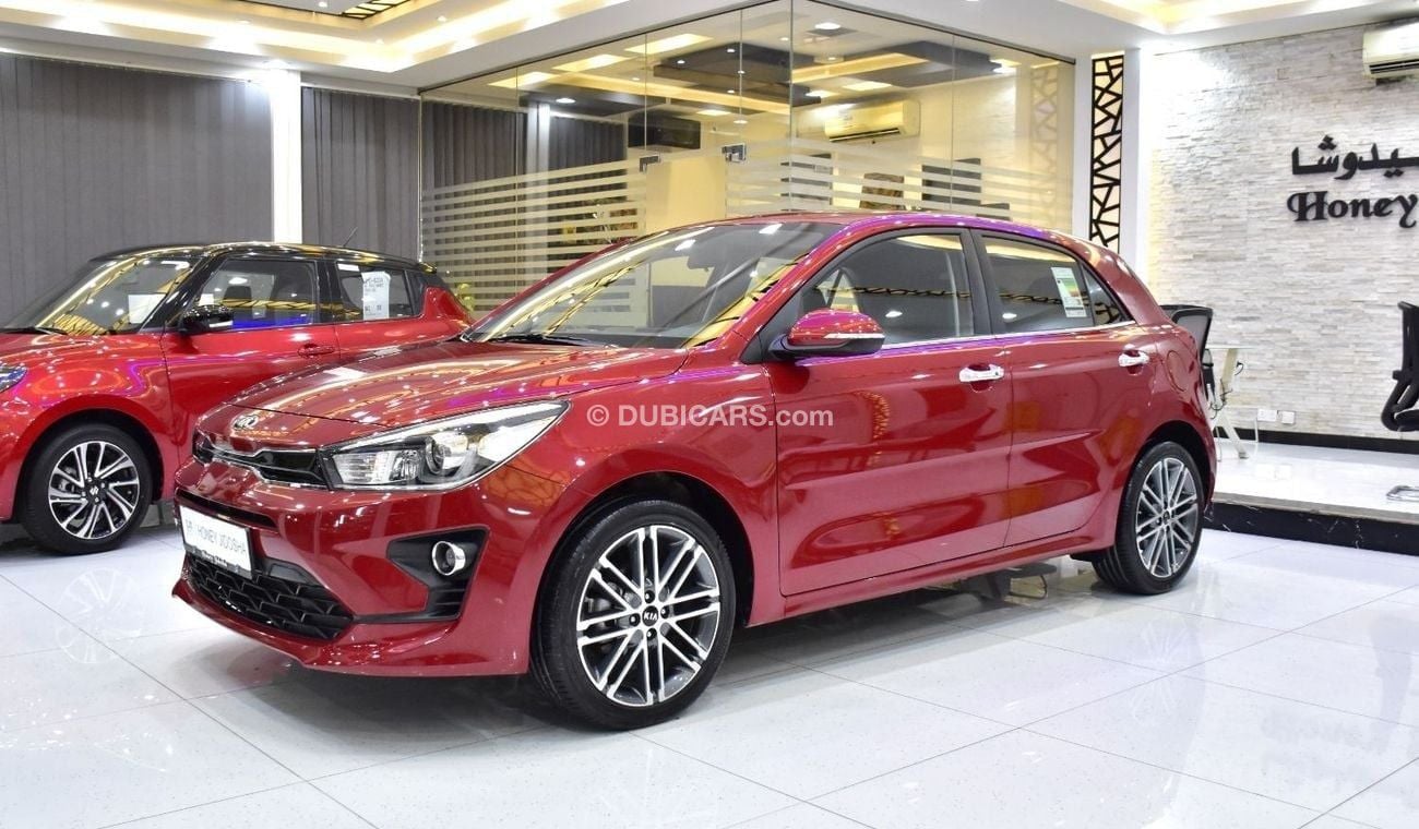 Kia Rio EXCELLENT DEAL for our KIA Rio 1.6L ( 2021 Model ) in Red Color GCC Specs