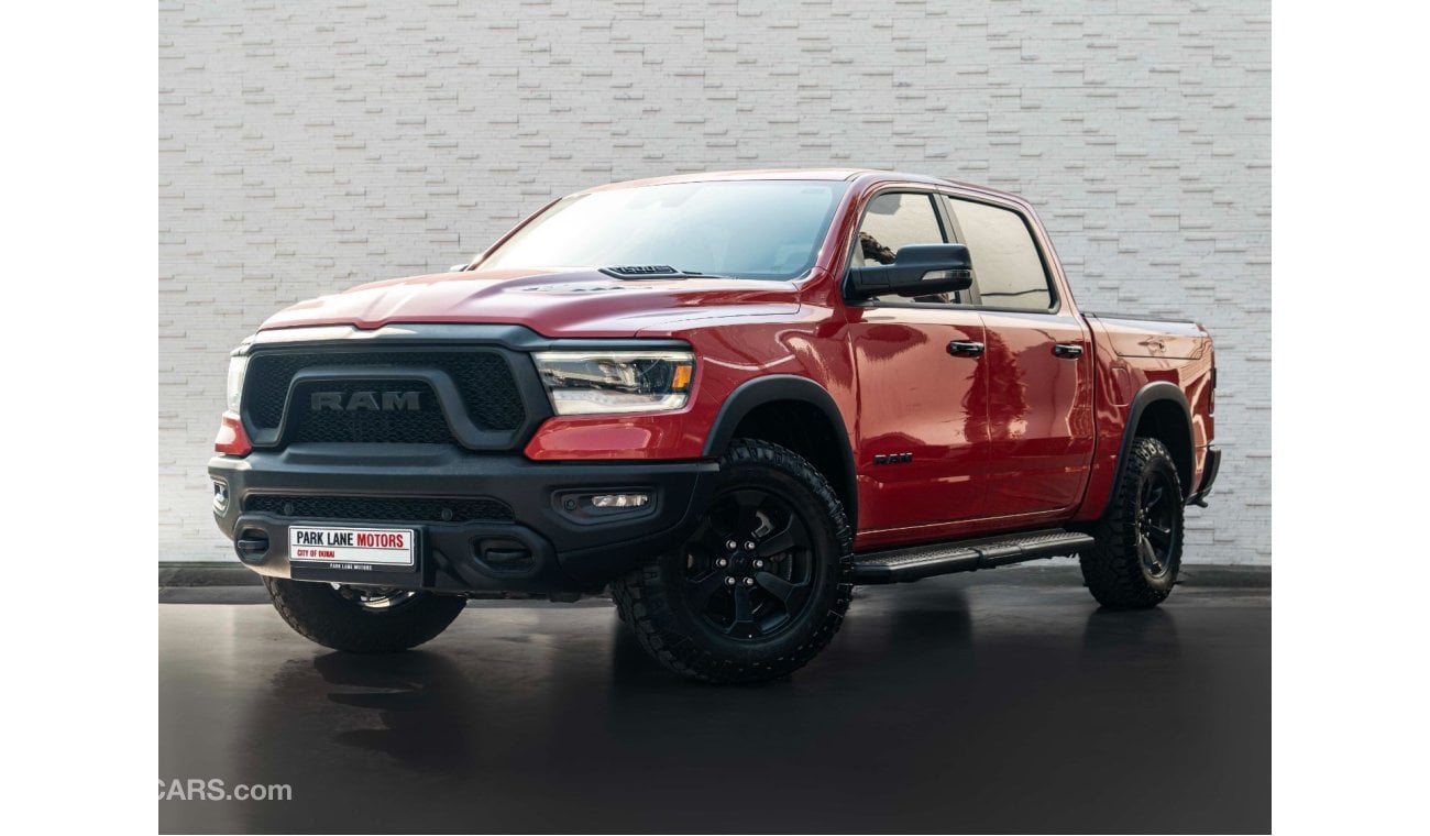 رام 1500 AED 3,460 PM • RAM 1500 REBEL LUXURY 5.7L HEMI® V8 • ONLY 13,000 KMS • DODGE WARRANTY + SERVICE PLAN