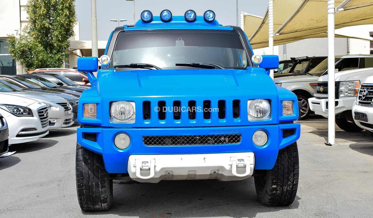 Hummer H3 White Color with blue wrapping