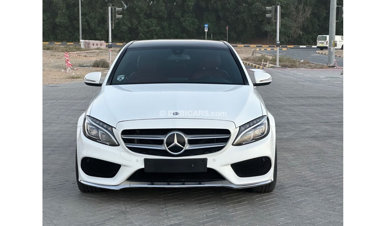 مرسيدس بنز C200 MODEL 2016 GCC CAR PERFECT CONDITION FULL OPTION PANORAMIC ROOF AMG