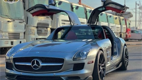 مرسيدس بنز SLS AMG Description For Sale: 2011 Mercedes-Benz SLS AMG Mileage: 21,000 km Exterior: Silver Interior: Red F