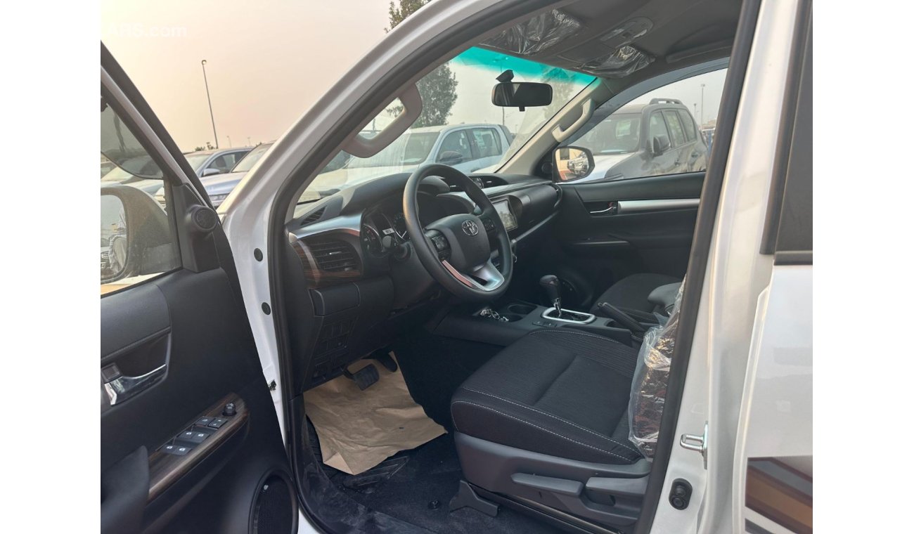 تويوتا هيلوكس TOYOTA HILUX 2.7 AT FULL OPTION 2024 WHITE WITH PUSH START