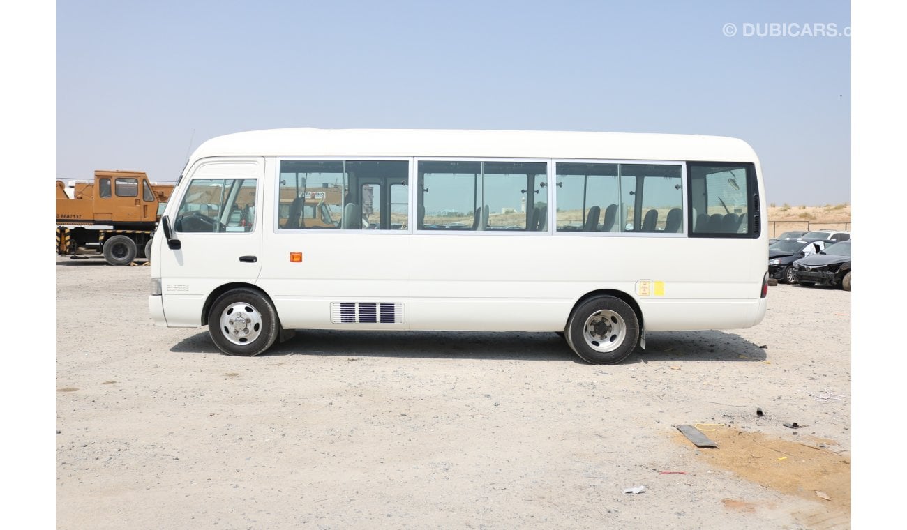 Used Toyota Coaster HI ROOF 30 SEATER BUS WITH GCC SPECS 2014 2014