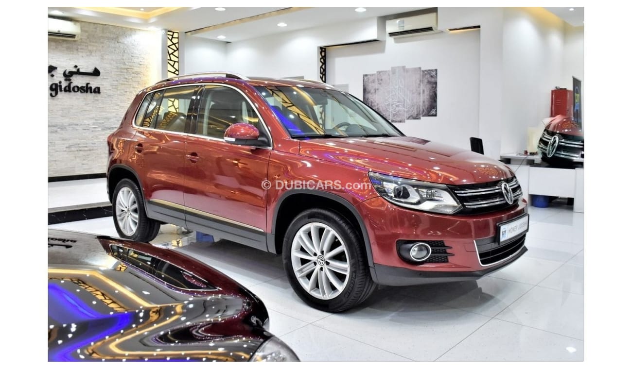 Volkswagen Tiguan EXCELLENT DEAL for our Volkswagen Tiguan 2.0 TSi 4Motion ( 2015 Model ) in Red Color GCC Specs