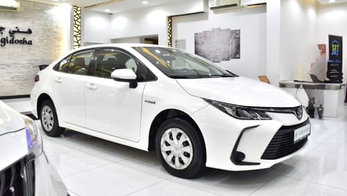 Toyota Corolla EXCELLENT DEAL for our Toyota Corolla Hybrid ( 2021 Model ) in White Color GCC Specs