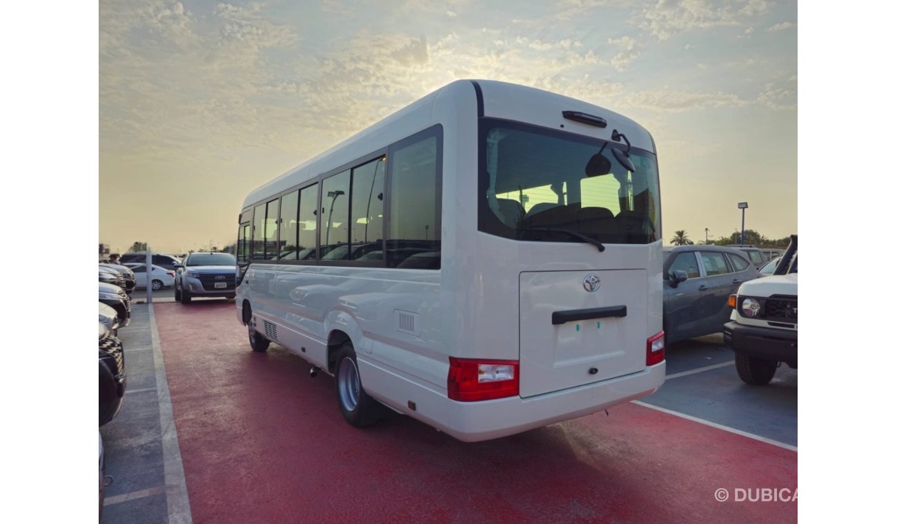 تويوتا كوستر 2024 TOYOTA COASTER 4.0L V6 22 SEATER 3 POINT BELT WITH COOL BOX, CURTAINS, LUGGAGE RACK