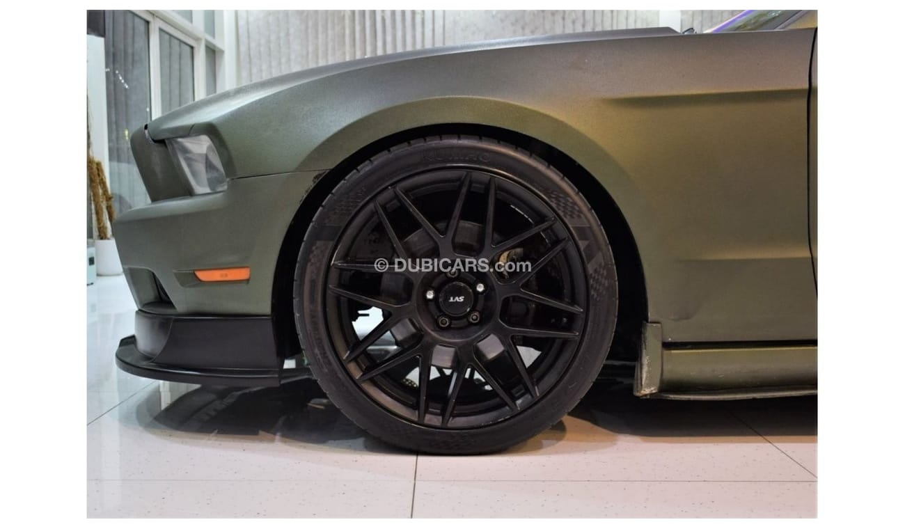 Ford Mustang EXCELLENT DEAL for our Ford Mustang 5.0 GT 2013 Model!! in Crinkled Green Color! GCC Specs