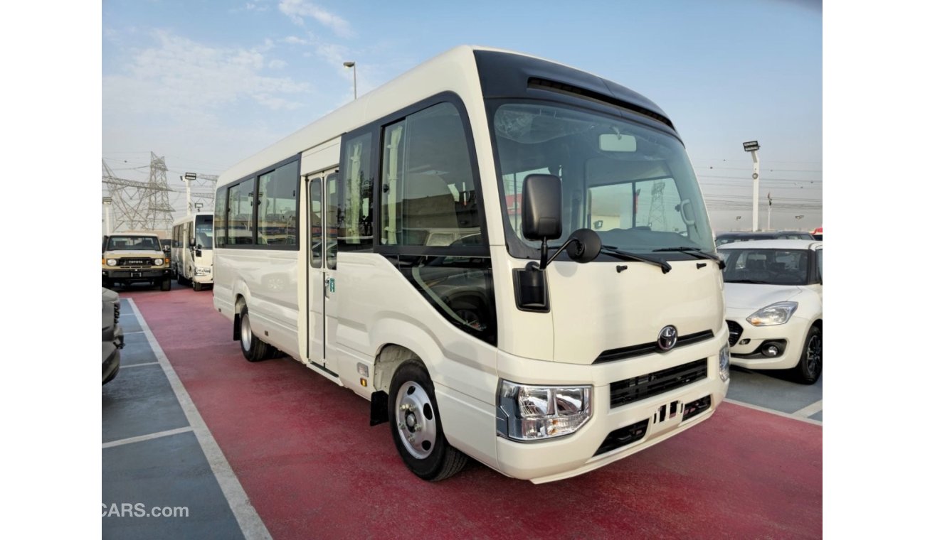 تويوتا كوستر 2024 TOYOTA COASTER 4.0L V6 22 SEATER 3 POINT BELT WITH COOL BOX, CURTAINS, LUGGAGE RACK