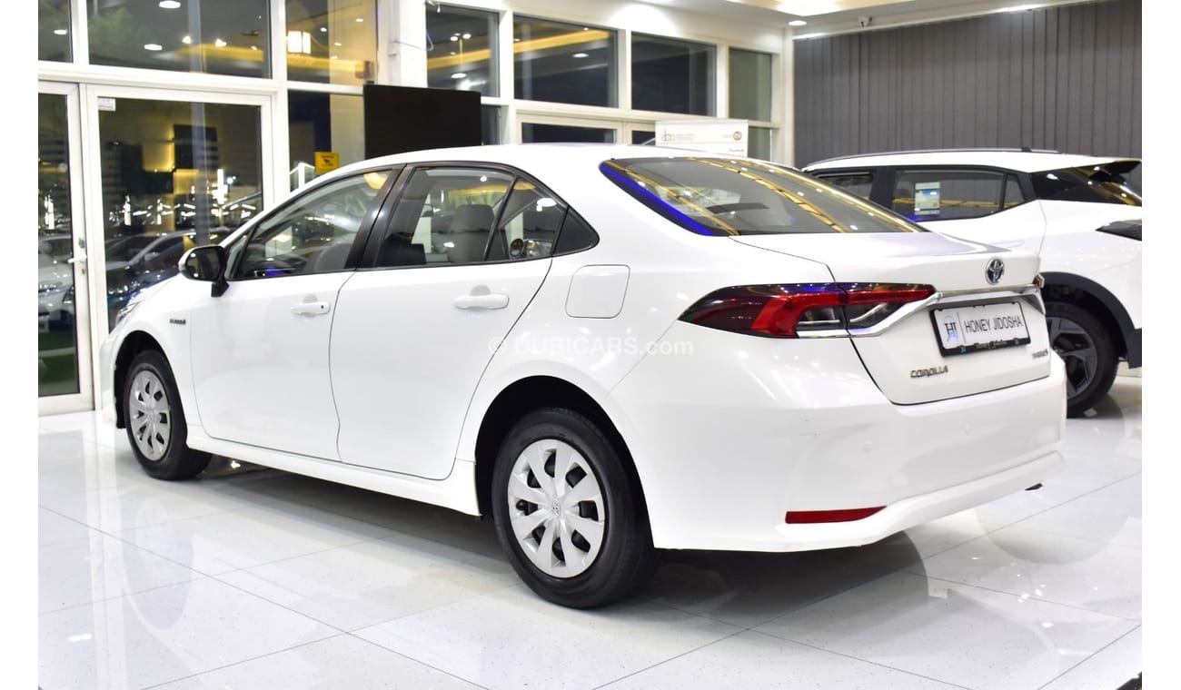 Toyota Corolla EXCELLENT DEAL for our Toyota Corolla Hybrid ( 2021 Model ) in White Color GCC Specs