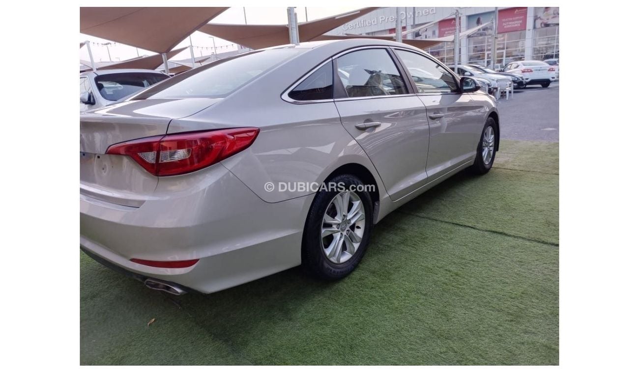 Hyundai Sonata 2016 Gulf model, cruise control, rear camera screen, front and rear air conditioning, alloy wheels i