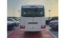 تويوتا كوستر 2024 TOYOTA COASTER 4.0L V6 22 SEATER 3 POINT BELT WITH COOL BOX, CURTAINS, LUGGAGE RACK