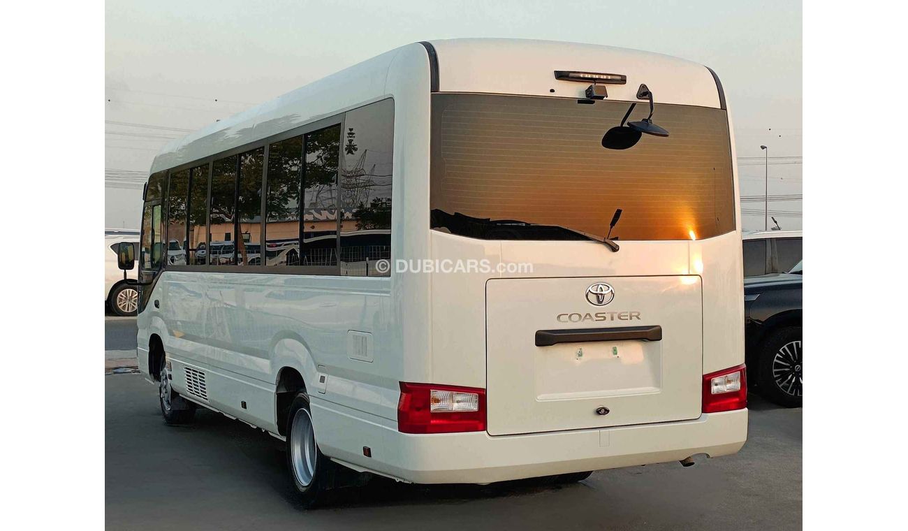 Toyota Coaster // MANUAL // 4.2L V6 //  DIESEL //  23 STRS (LOT # 10854)