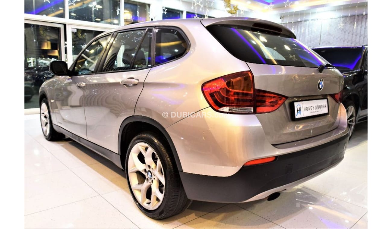 BMW X1 S Drive 2011 Model!! in Gold Color! GCC Specs