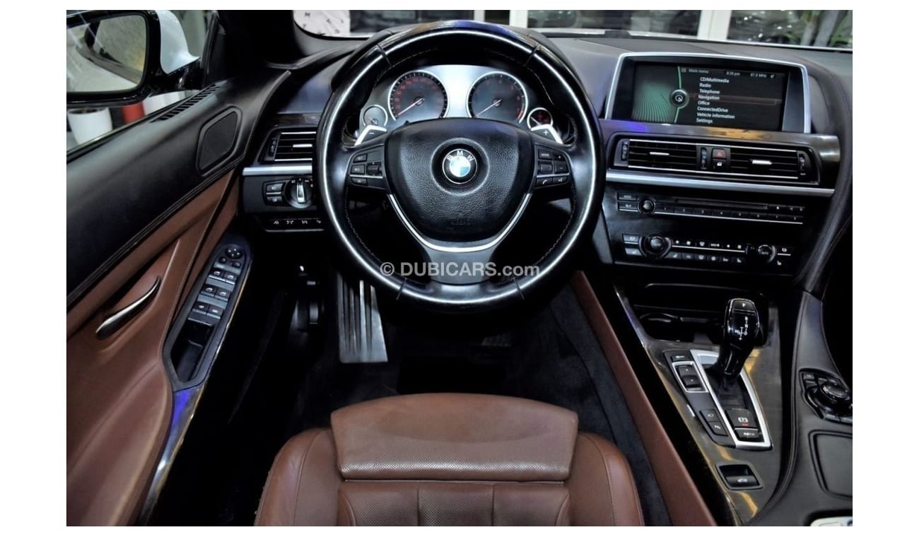 BMW 650i EXCELLENT DEAL for our BMW 650i CONVERTIBLE ( 2011 Model ) in White Color GCC Specs