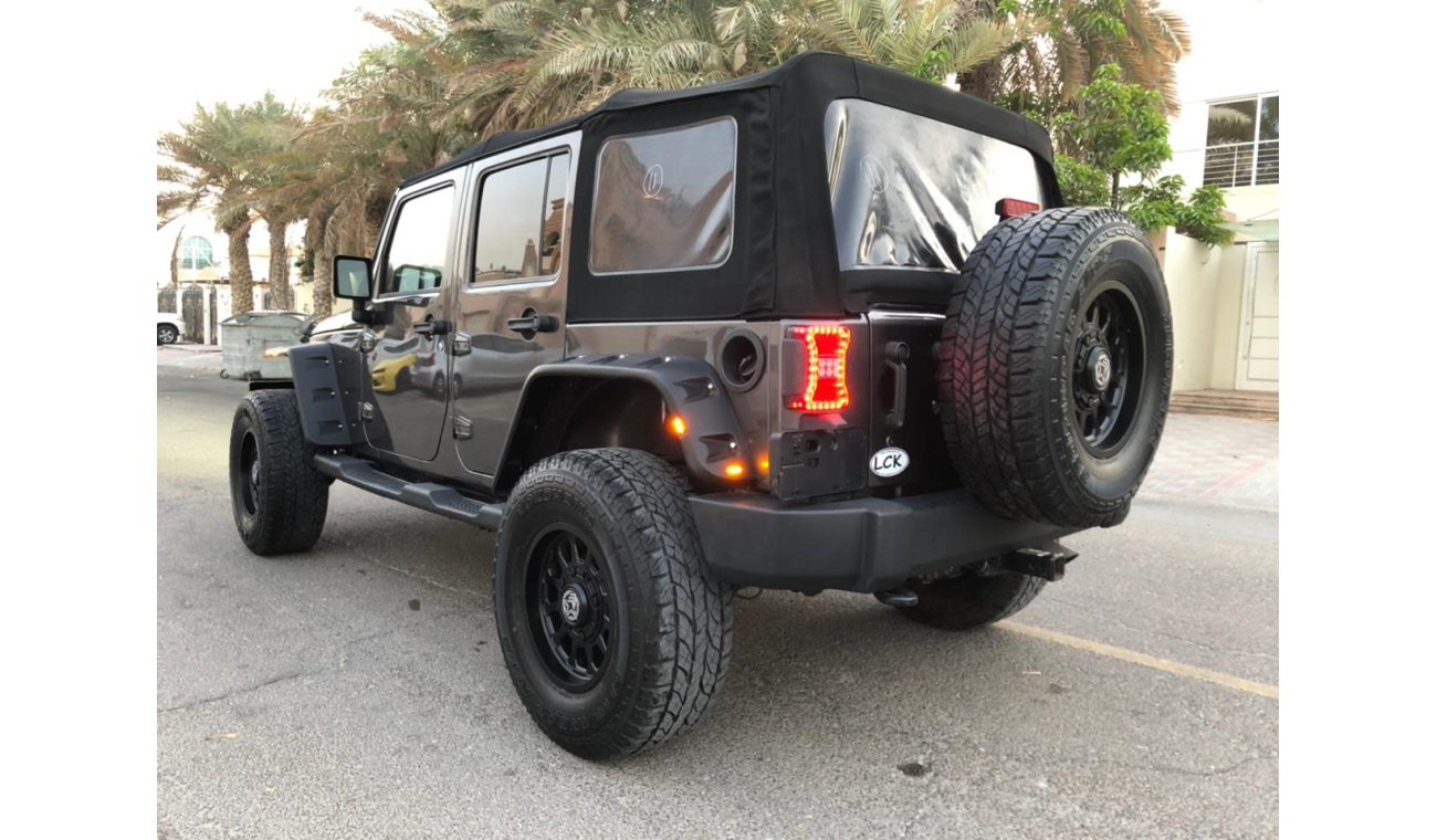 جيب رانجلر 3.6L Petrol, 17" Rims, Front A/C, Rear Camera, DVD, Leather Seats, LED Headlights (LOT # JW2016)