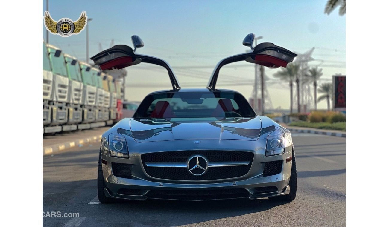 Mercedes-Benz SLS AMG Description For Sale: 2011 Mercedes-Benz SLS AMG Mileage: 21,000 km Exterior: Silver Interior: Red F