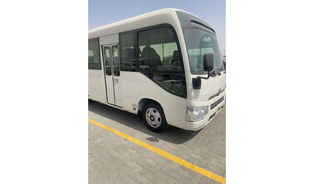 Toyota Coaster 4.2L DIESEL 23 SEATER WITH AUTO DOOR AND 3-P SEATBELT M/T, 2024 MODEL