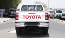 Toyota Hilux 2.4L diesel  . White 2024 model, M/T Wide body with Chrome bumper