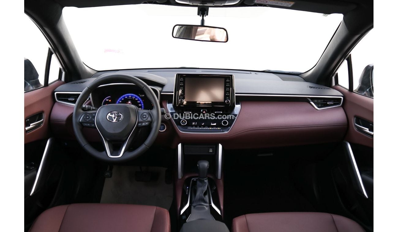 Toyota Corolla Cross Best offer for the new Corolla Cross Hybrid 2024 1.8L contact Now | Terra rosa color interior