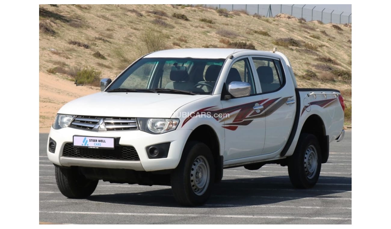 Mitsubishi L200 2015 |  L200 D/C 4X4 DIESEL MT WITH GCC SPECS AND EXCELLENT CONDITION