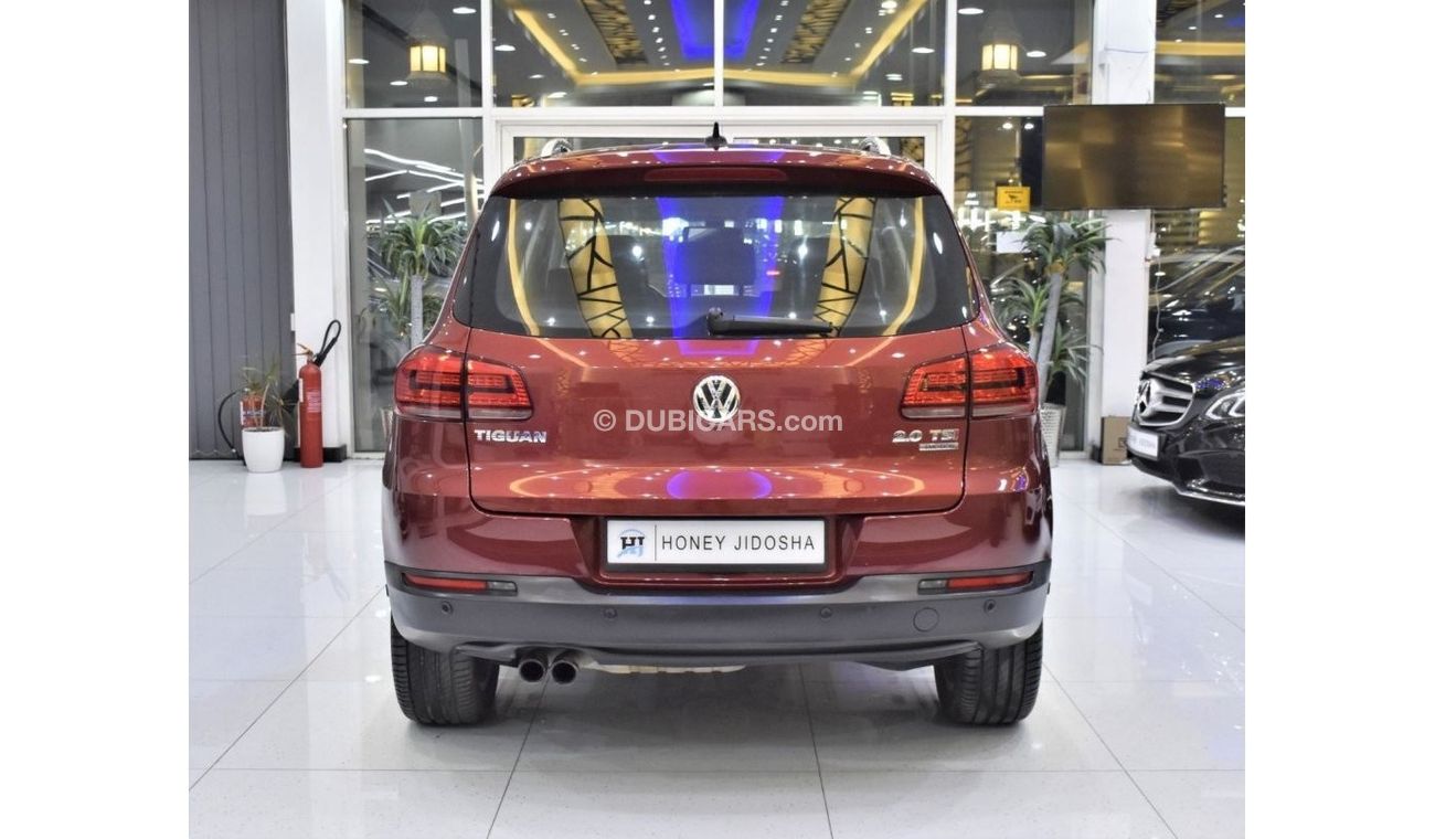 Volkswagen Tiguan EXCELLENT DEAL for our Volkswagen Tiguan 2.0 TSi 4Motion ( 2015 Model ) in Red Color GCC Specs