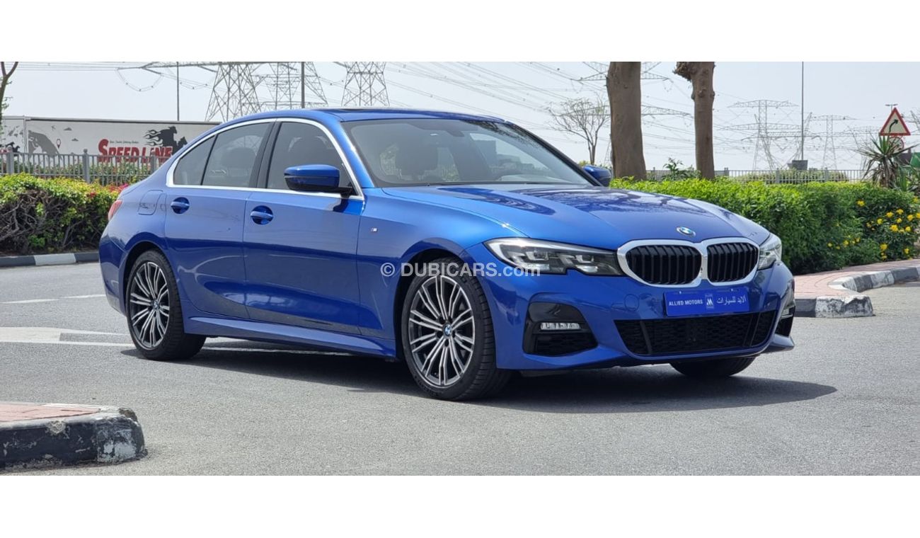 Used BMW 320 i - M KIT - 2020 - Blue 2020 for sale in Dubai - 505623