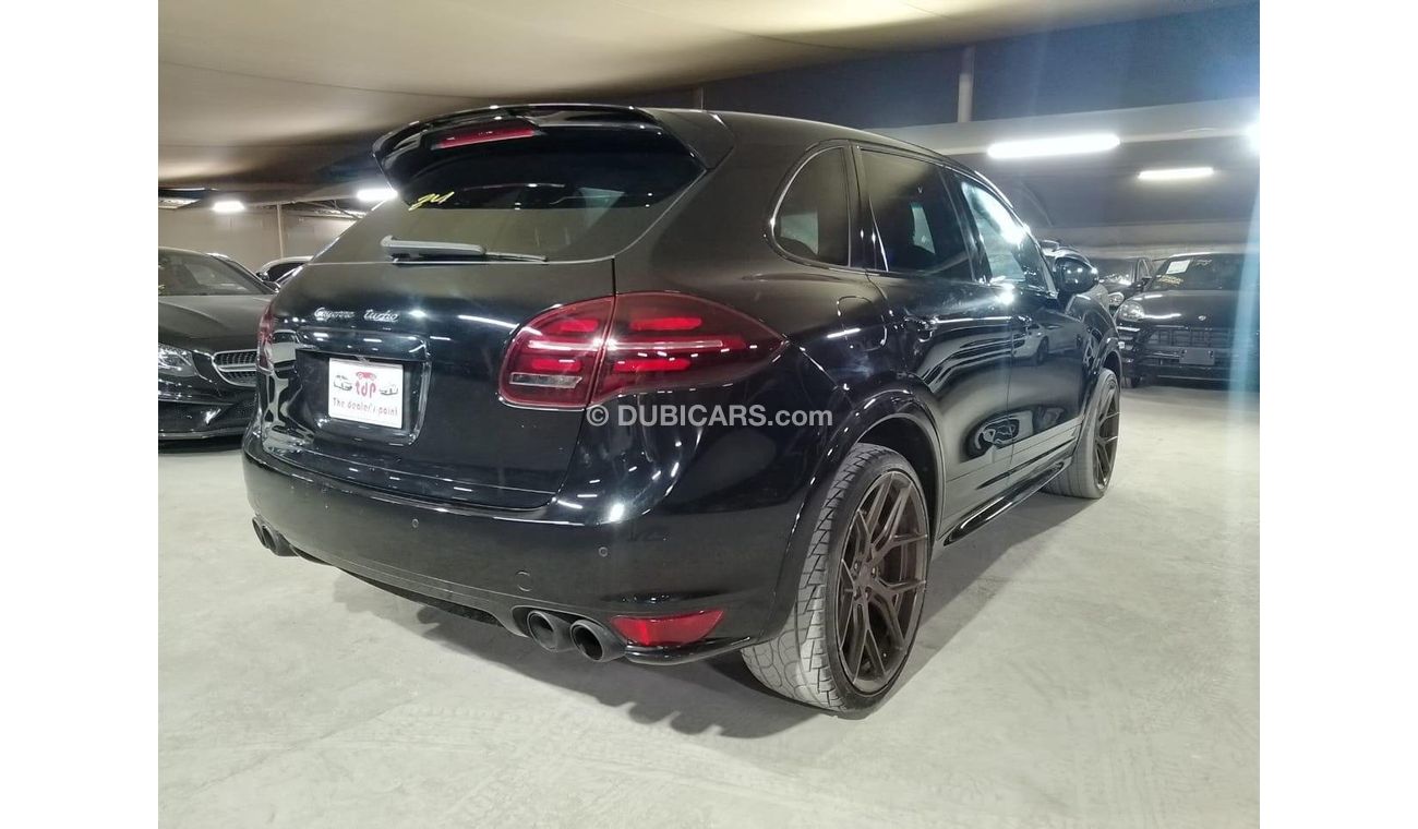 Porsche Cayenne Turbo 4.8L (500 HP) WITH MANSORY CARBON BONNET, MANSORY CARBON INTERIOR AND MORE..