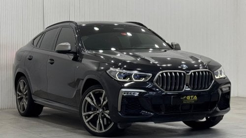 بي أم دبليو X6 50i Exclusive 4.4L 2021 BMW X6 M50i, 2026 AGMC Agency Warranty + Service Package, Full Service Histo