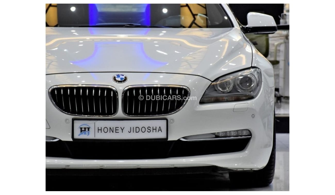 BMW 650i EXCELLENT DEAL for our BMW 650i CONVERTIBLE ( 2011 Model ) in White Color GCC Specs