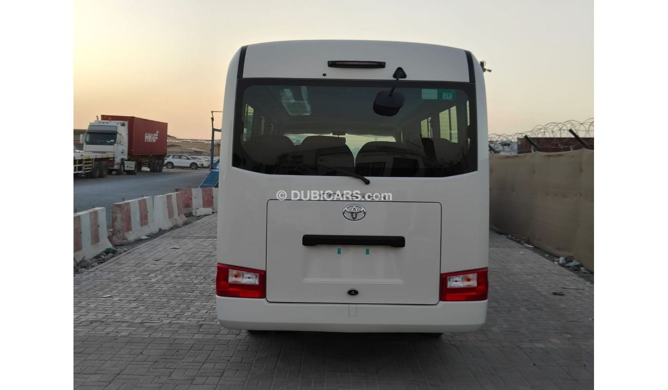 تويوتا كوستر 2024 Toyota Coaster High-Roof 23-Seater 4.0L 4-Cyl Turbo Diesel M/T RWD (Auto Closing Door) Export O