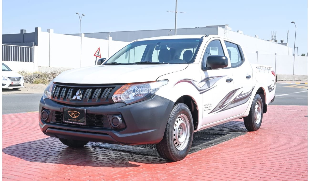 Mitsubishi L200 2016 | MITSUBISHI L200 4X2 | PICKUP DOUBLE CABIN | 6-SEATER | 4-DOORS | GCC | VERY WELL-MAINTAINED |