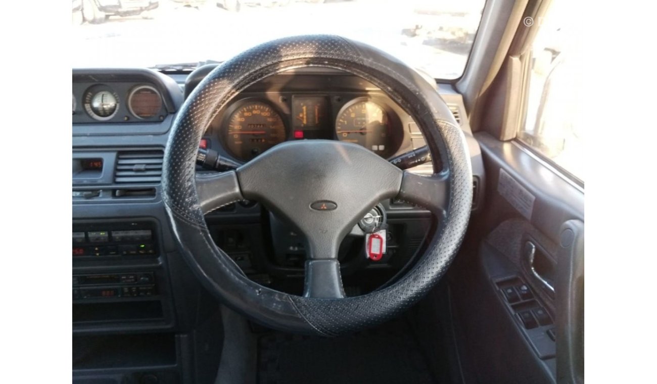 Leather steering wheel complete with mitsubishi pajero v20 airbag