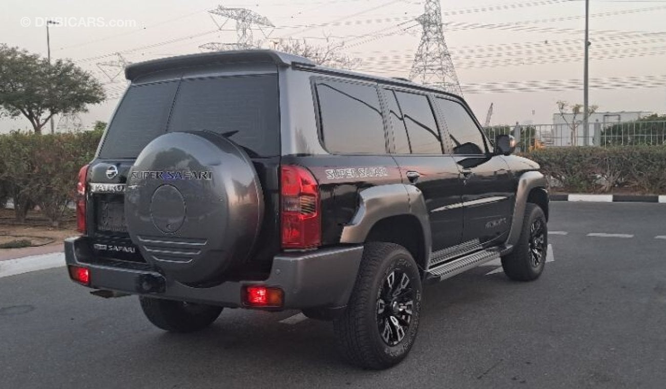 نيسان باترول سوبر سفاري SUPER SAFARI FREE SERVICE 40K KM + 5 YEAR WARRANTY AL ROSTMANI UNLIMIT KM +DOMNSONS -KING JUMP + PPF