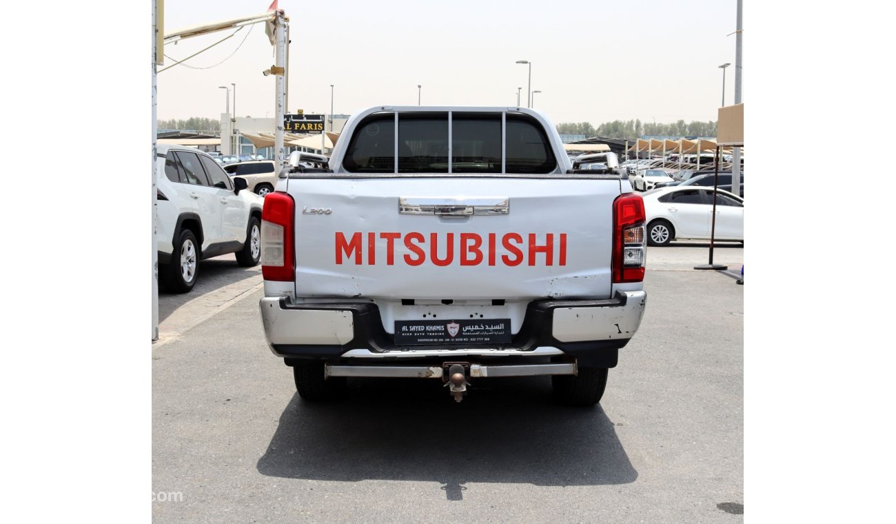 Mitsubishi L200 GLS ACCIDENTS FREE  - GCC - ORIGINAL PAINT - PETROL - 4WD - PERFECT CONDITION INSIDE OUT