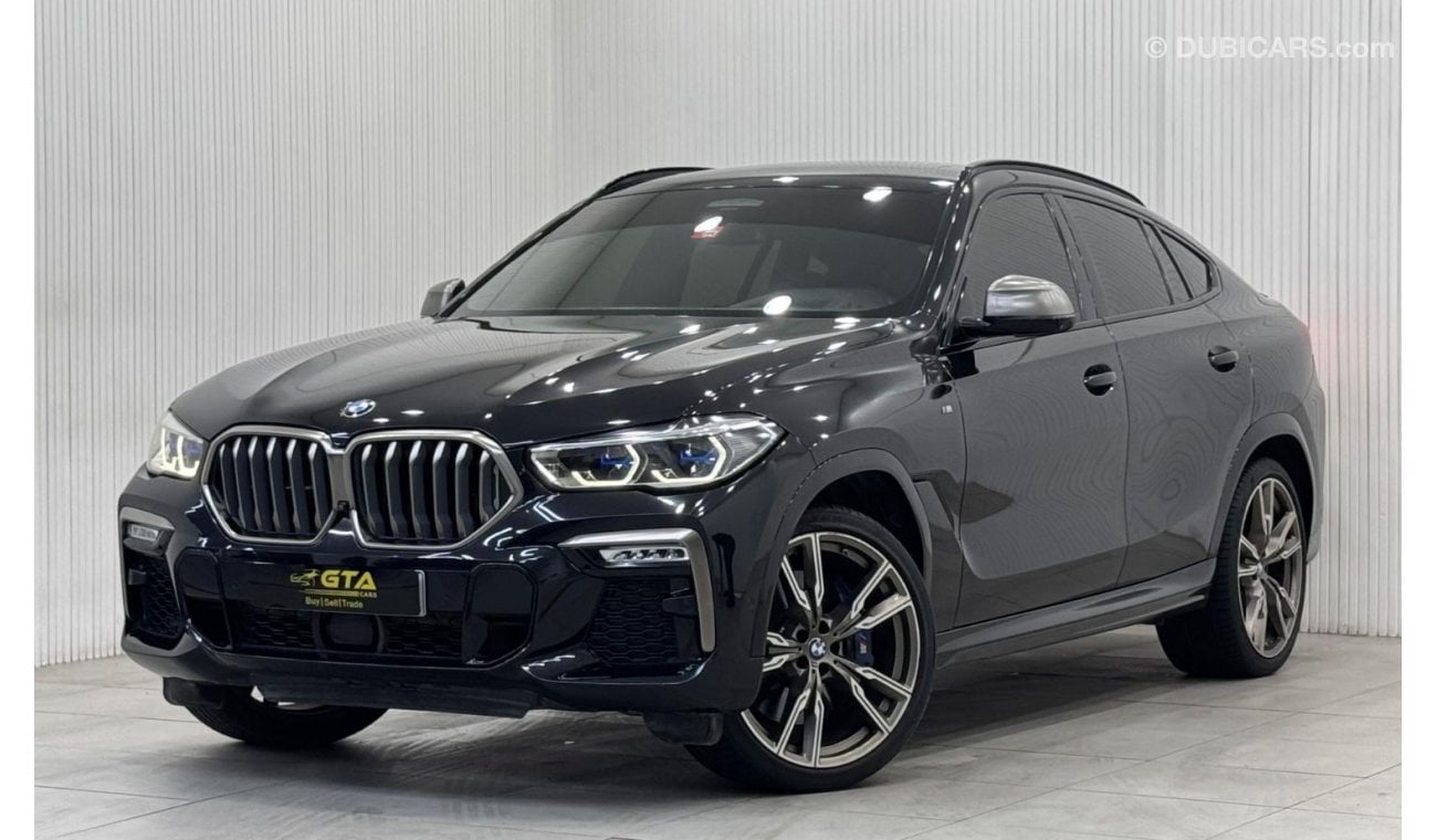 بي أم دبليو X6 50i Exclusive 4.4L 2021 BMW X6 M50i, 2026 AGMC Agency Warranty + Service Package, Full Service Histo