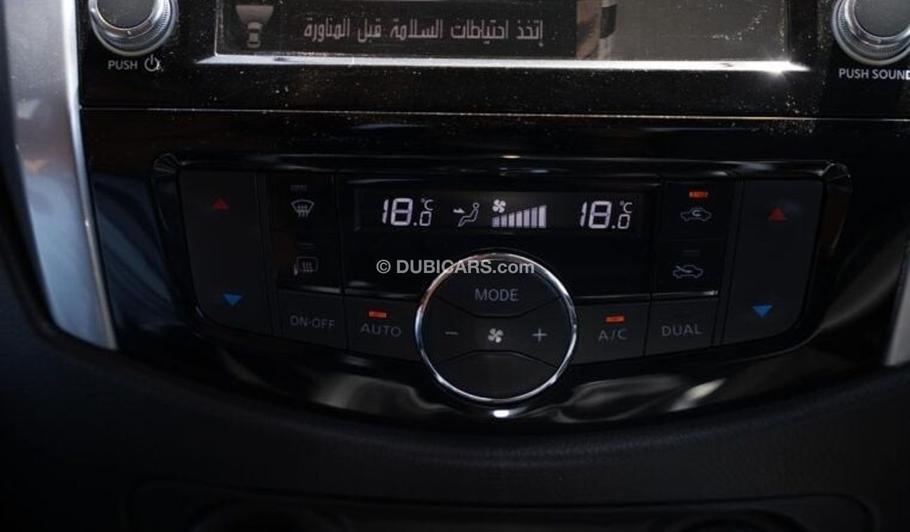 نيسان نافارا 2.5L PETROL 4X4 MANUAL FULL OPTION GCC