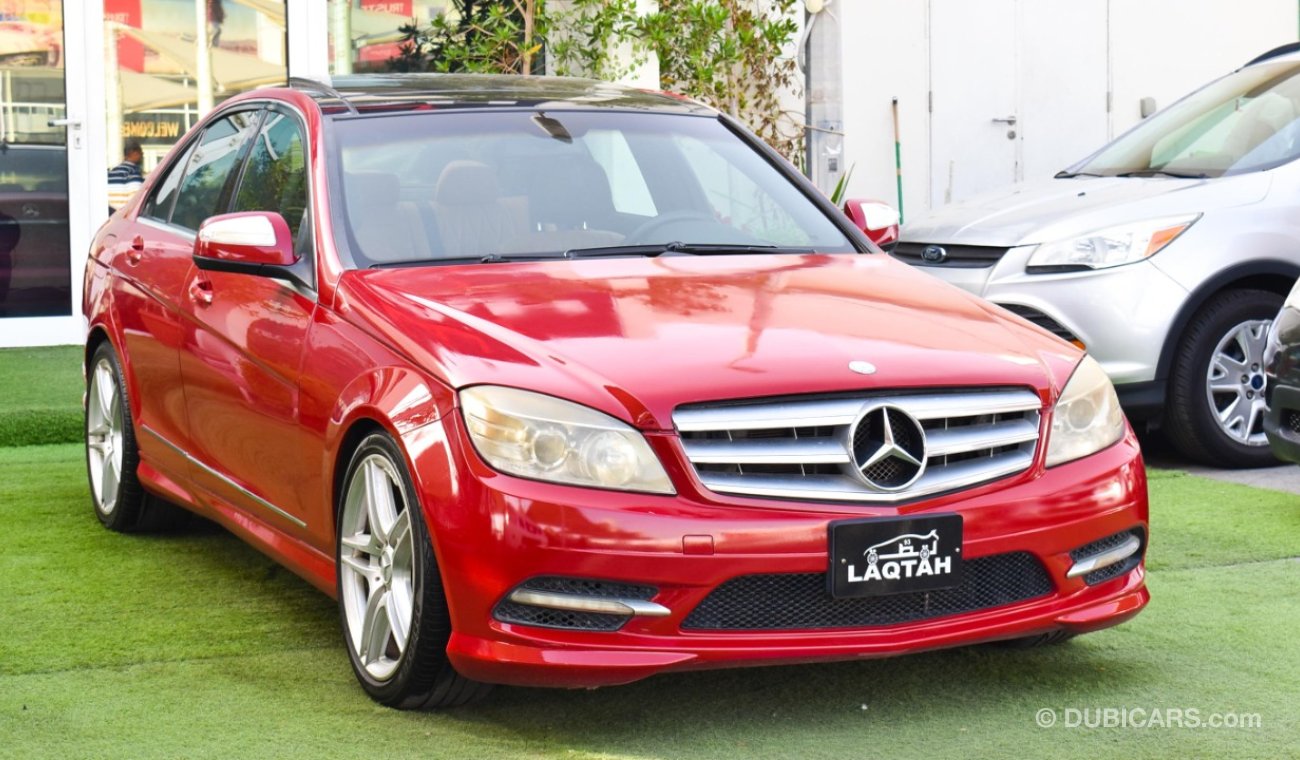Mercedes-Benz C 300 2009 model, red color, number one, panorama, leather, cruise control, sensor wheels, in excellent co