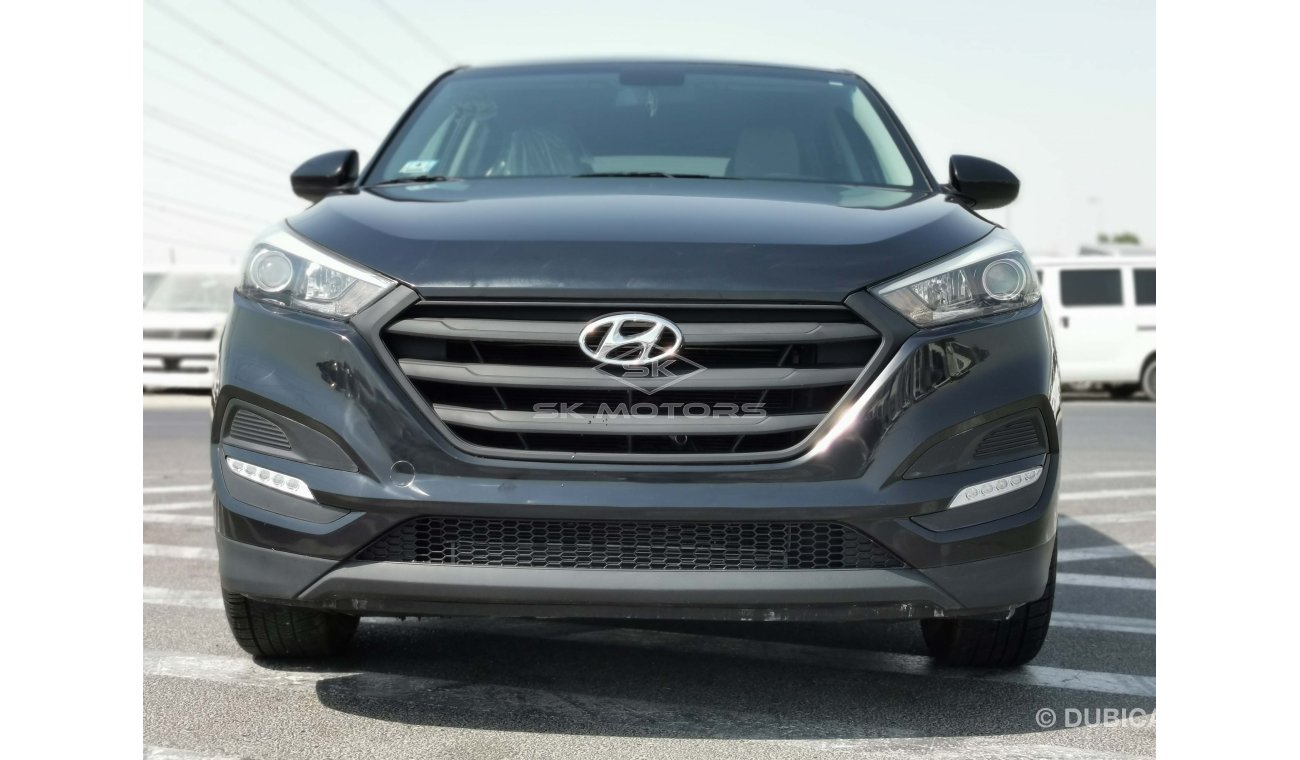 Hyundai Tucson 2.0L, 17" Rim, DRL LED Headlights, Fog Light, Drive Mode, DVD, Rear Camera, Dual Airbags (LOT # 782)