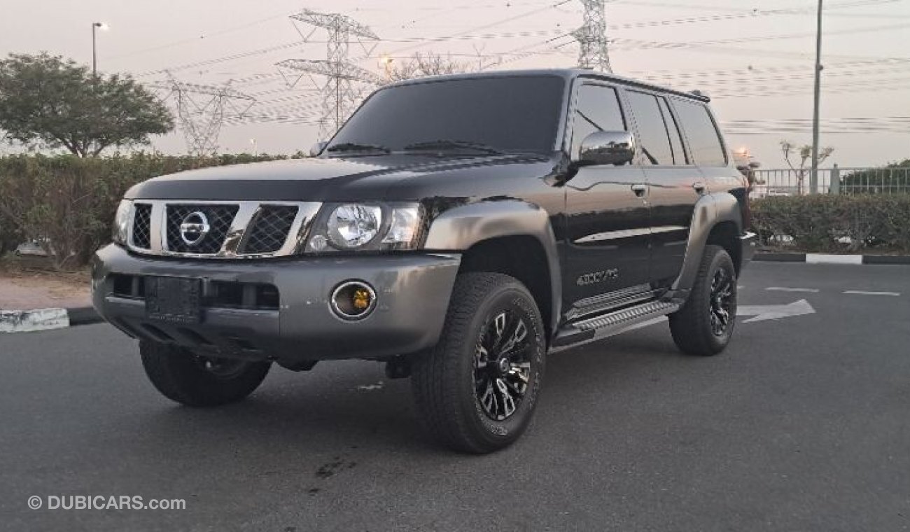 نيسان باترول سوبر سفاري SUPER SAFARI FREE SERVICE 40K KM + 5 YEAR WARRANTY AL ROSTMANI UNLIMIT KM +DOMNSONS -KING JUMP + PPF