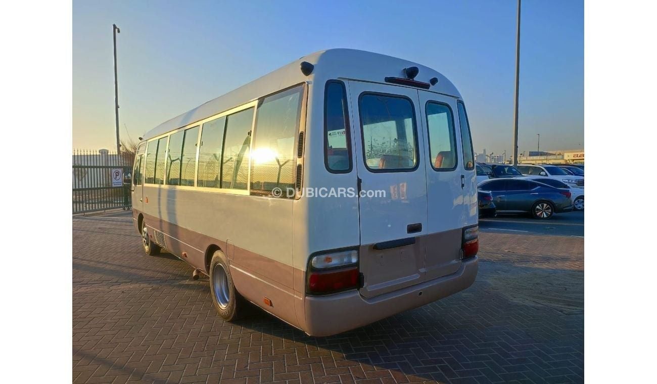 Toyota Coaster JTGFP518504500593 || TOYOTA COASTER (BUS) | || DIESEL || LHD || MANUAL