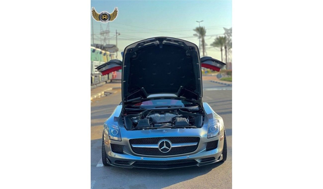 Mercedes-Benz SLS AMG Description For Sale: 2011 Mercedes-Benz SLS AMG Mileage: 21,000 km Exterior: Silver Interior: Red F