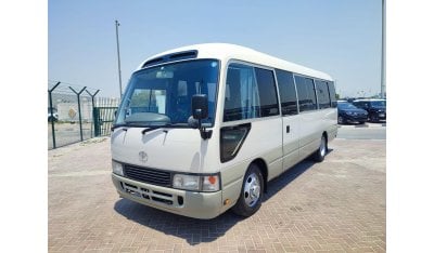 Toyota Coaster HZB56-0001297 || TOYOTA	COASTER (BUS)	1997	WHITE  	4200	DIESEL	47735	RHD	MANUAL ||