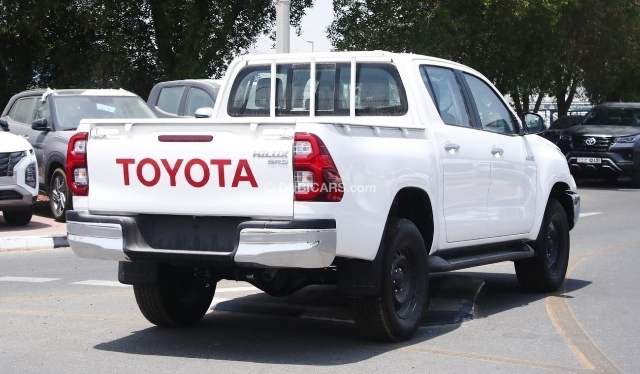 Toyota Hilux 2.4L diesel  . White 2024 model, M/T Wide body with Chrome bumper