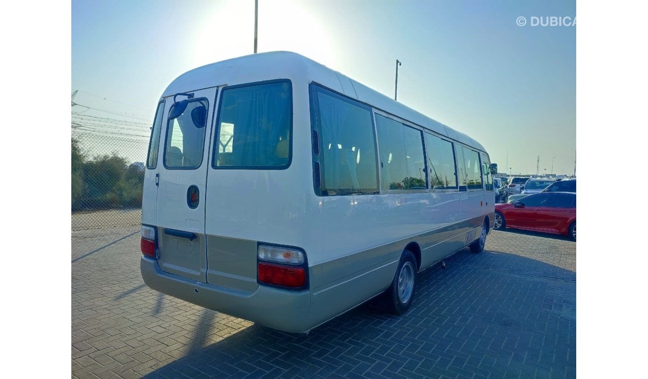 Toyota Coaster JTGEC538405000309 || 2008 WHITE GREY	4000	DIESEL	261785	RHD	MANUAL RIGHT HAND DRIVE.