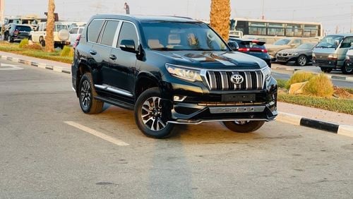 Toyota Prado TX-L Top Toyota Prado 2013 facelifted 2022TX-L V4 2.7 petrol left hand drive