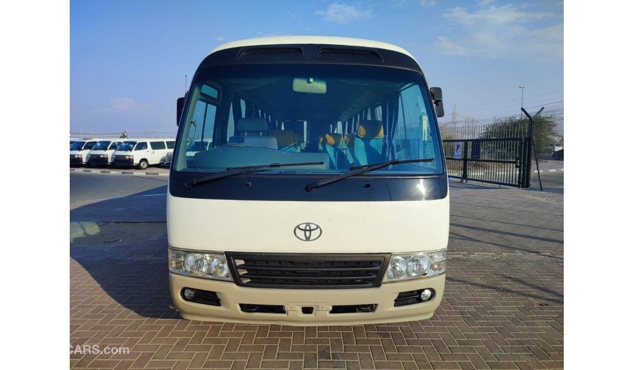 Toyota Coaster JTGEC538405000309 || 2008 WHITE GREY	4000	DIESEL	261785	RHD	MANUAL RIGHT HAND DRIVE.