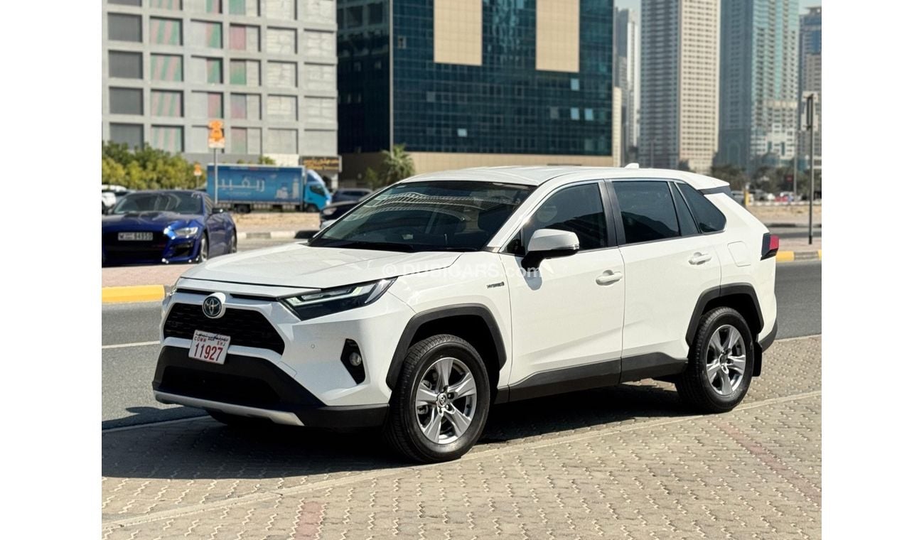 Toyota RAV4 Toyota RAV4 2024 Hybrid – White 	•	Engine & Performance: 2.5L 4-cylinder hybrid engine paired with a