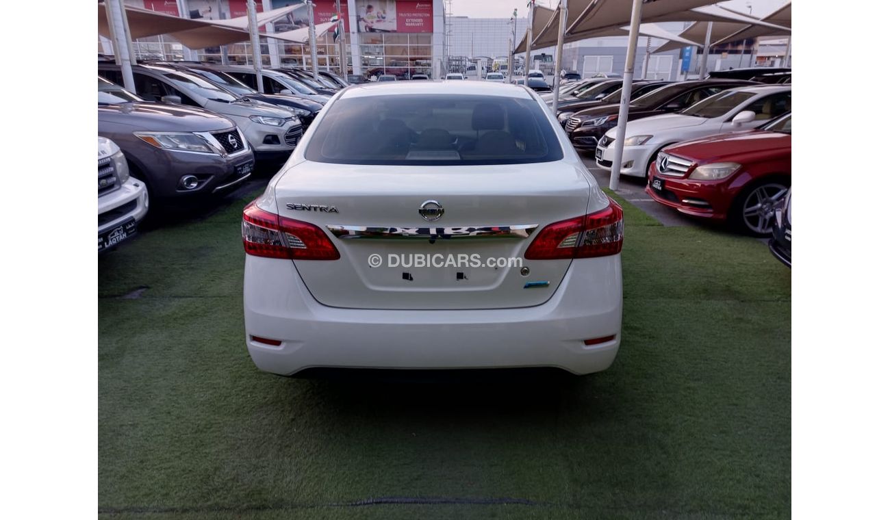 Nissan Sentra GCC model 2016 without accidents, white color, beige interior, Android screen, rear camera, in excel