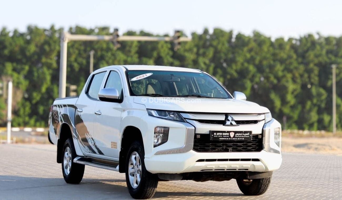 ميتسوبيشي L200 GLX 2.4L Mitsubishi L200 2.4 L 2021 GCC accident free in excellent condition 1303 P.M